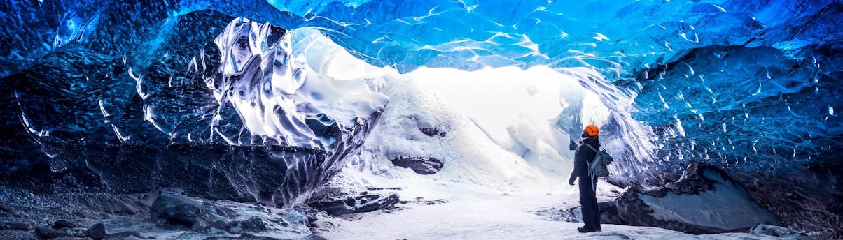 Tours & Activities Sólheimajökulll SEM Hero A person exploring a glacier in Iceland.