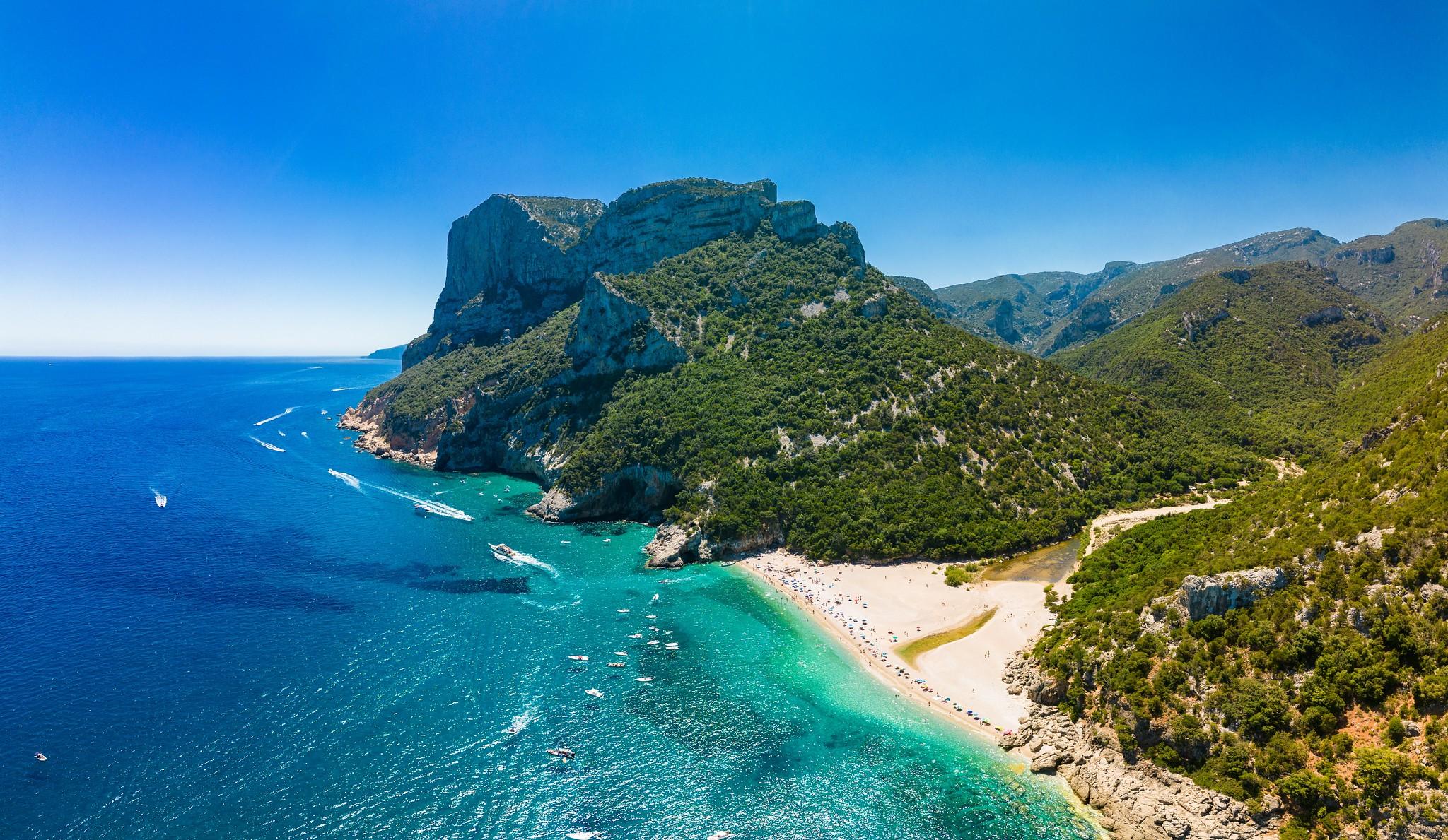 A view from above of Cala Sisine and its pristine waters.