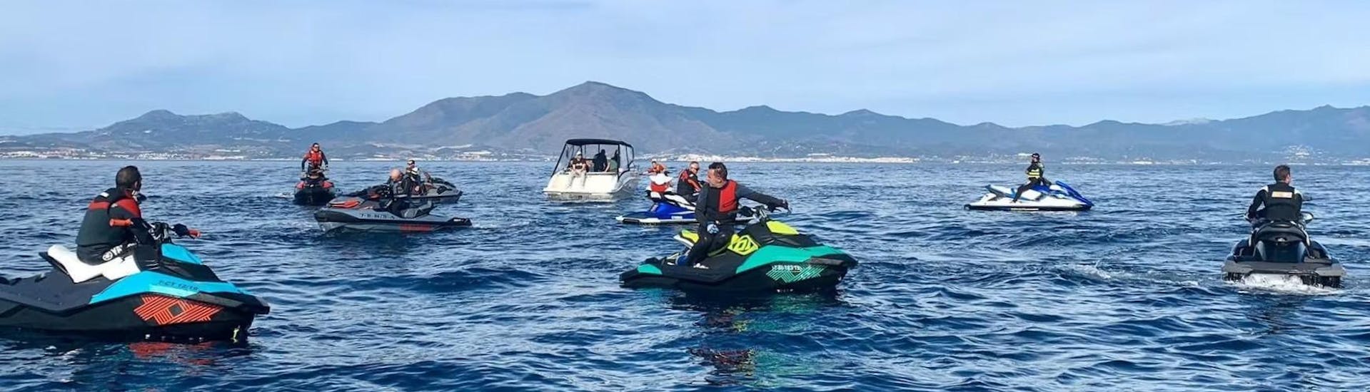 Participants out on a sunny day in Costa del Sol jet skiing during a jet ski safari to Puerto Sotogrande with Marbella Jet Center.
