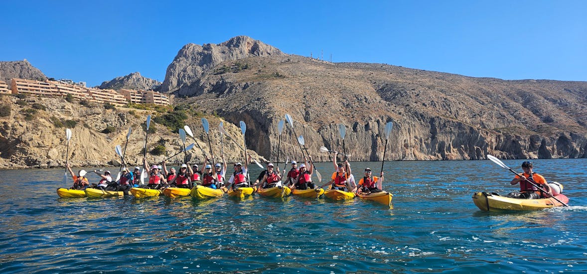 A group enjoys a sea kayak route in Alicante with Alicante Aventura.