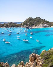 An image of the beautiful Cala Corsada, one of the places you get to visit on a boat tour in La Maddalena.