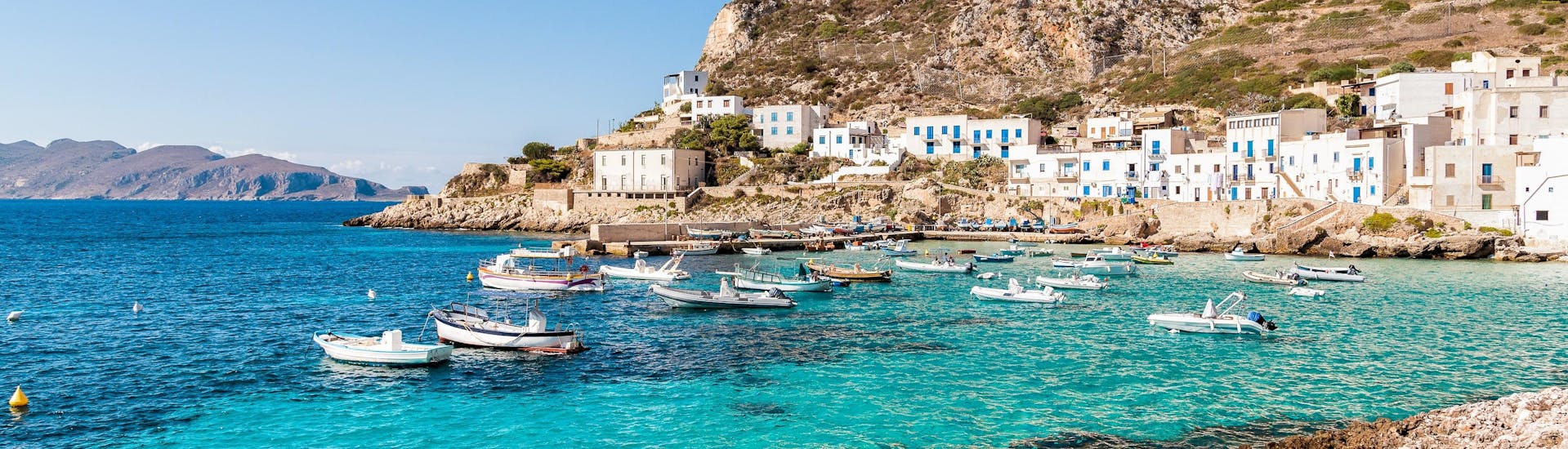 A view of the coastline of the island of Levanzo that visitors can see on a boat trip to the Egadi Islands in Sicily.