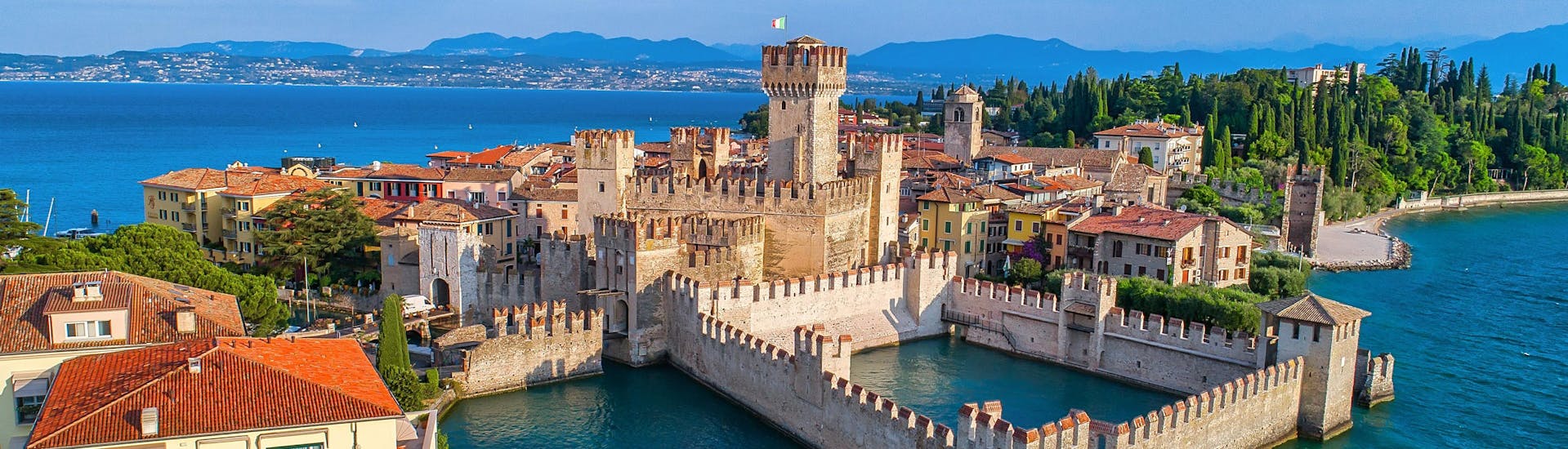 An aerial view of the Scaligero Castle in Sirmione, one of the sights you can see on a boat trip on Lake Garda.