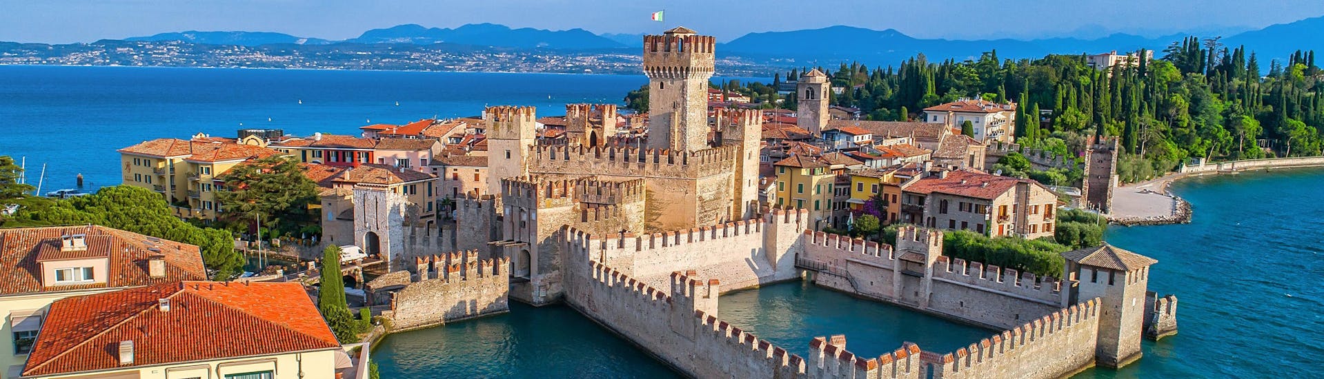 An aerial view of the Scaligero Castle in Sirmione, one of the sights you can see on a boat trip on Lake Garda.