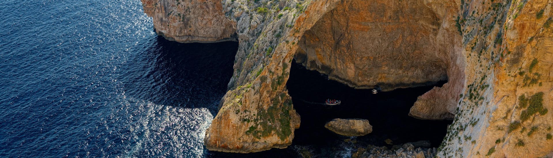 View of the Blue Grotto, in Gozo Malta, a popular destination for boat trips.