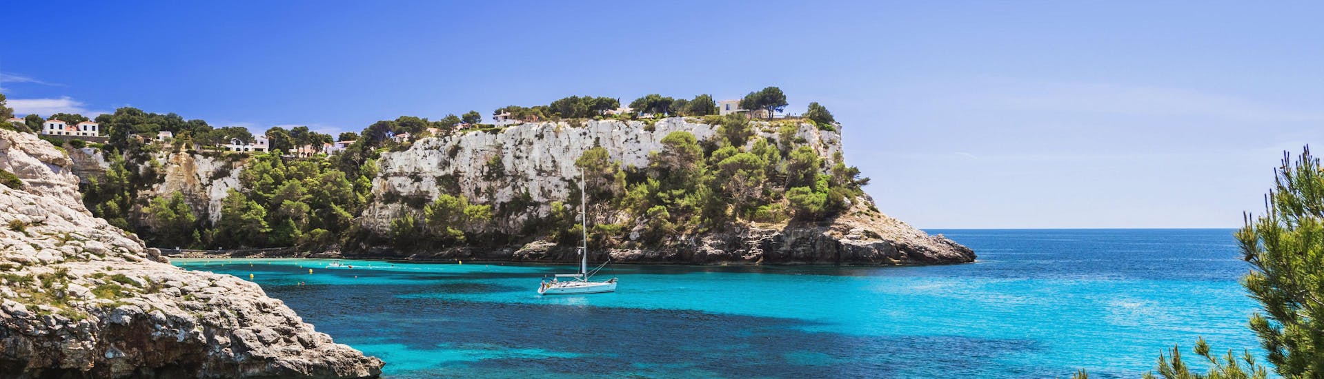 View of the crystal clear water of the Mediterranean Sea in Menorca during a boat trip.