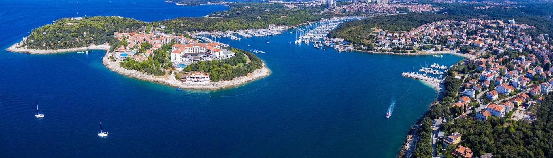 Beautiful view of Pula City Port, a popular destination for boat trips and rental.