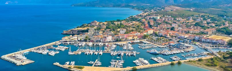 An aerial view of the port of Saint-Florent in the north of Corsica, where many boat trips to Cap Corse are starting.