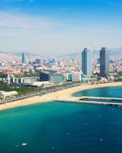 An aerial view of Playa de la Barceloneta, a popular place for boat trips in Barcelona.