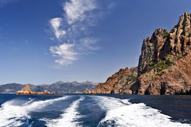View from the back of a boat during a boat trip in the impressive Calanques de Piana on the west coast of Corsica.