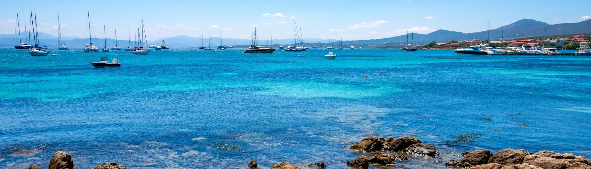 View of Golfo Aranci, a beautiful area of Sardinia that you can discover during a boat trip.
