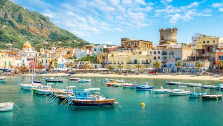 View of a beautiful seashore town in Ischia where boat providers offer their tours. 