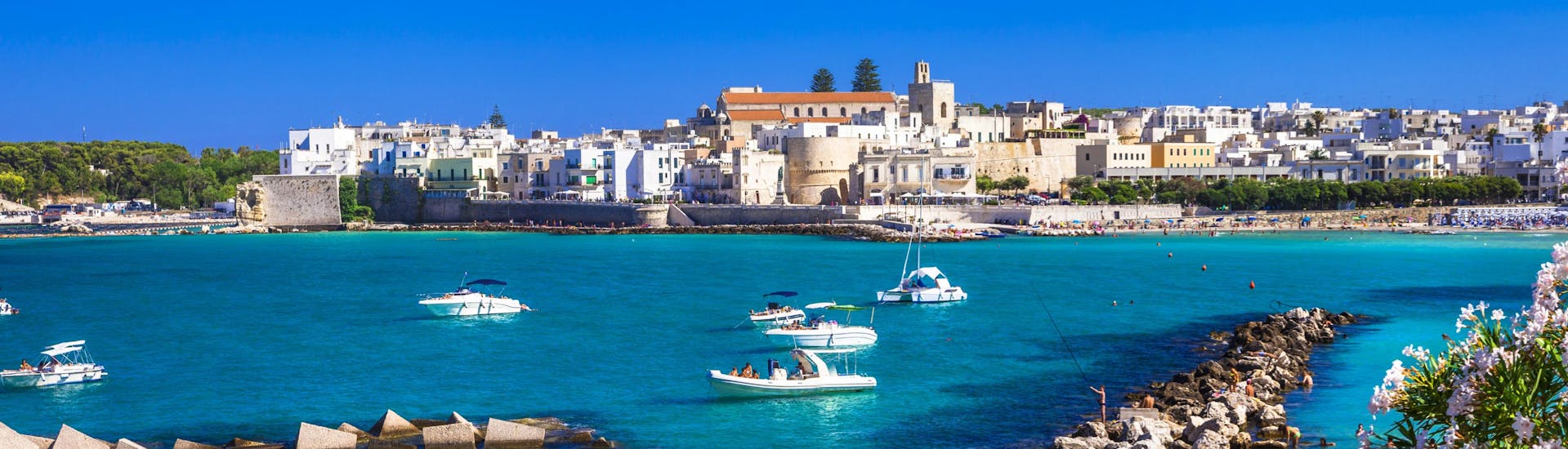 The city of Otranto seen by the sea, a beautiful view that you can enjoy during a boat trip.
