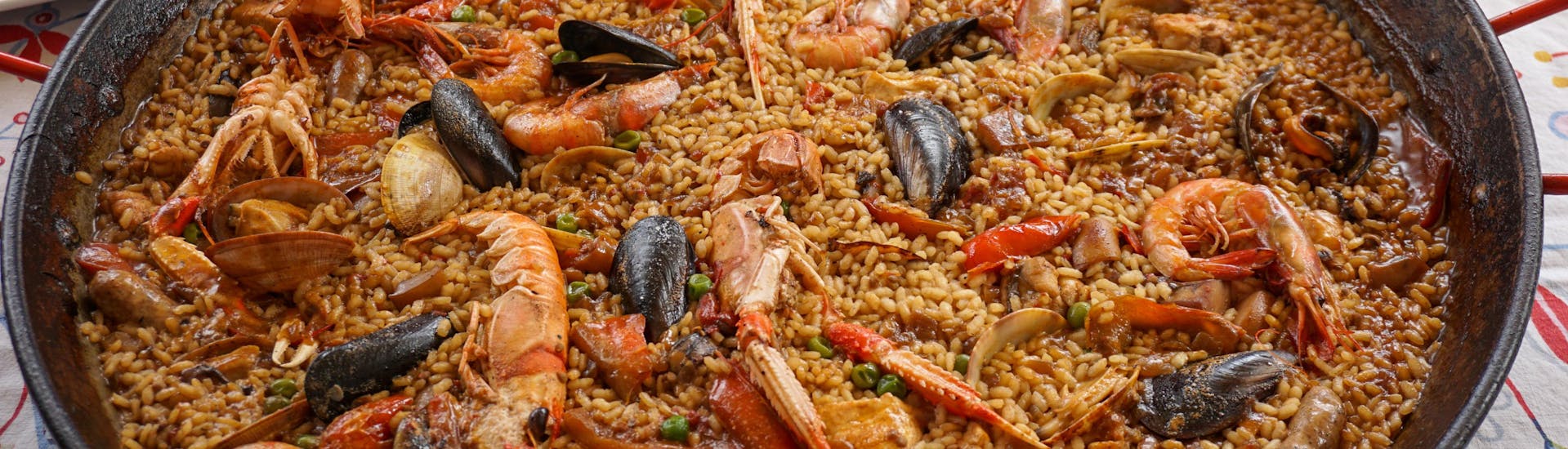 A paella before being served in a boat trip with Paella.