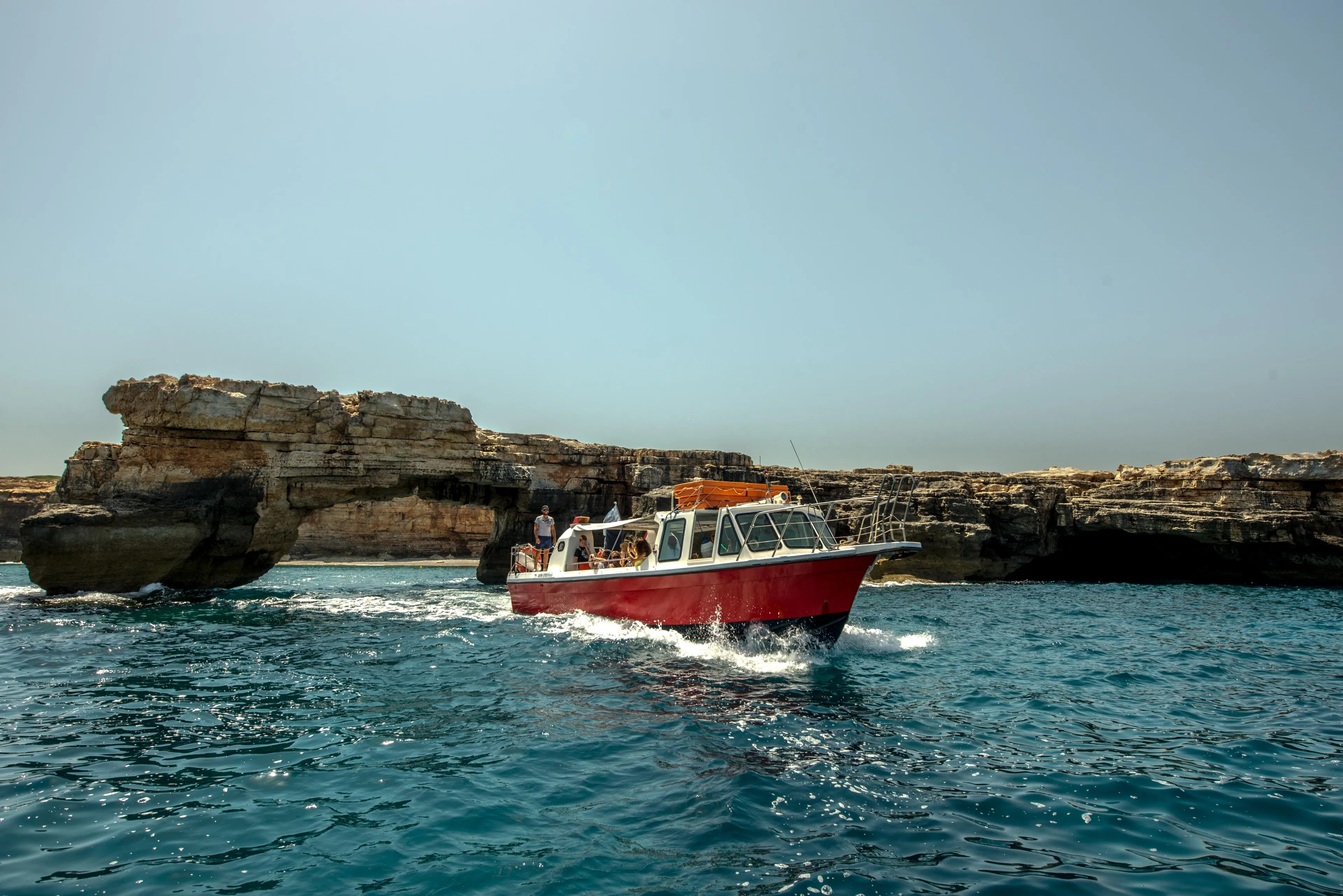 Beautiful landscapes showcasing mountains and sea, where the experiences of DOLPHIN EXPRESS IV - The Fast Boat are taking place.