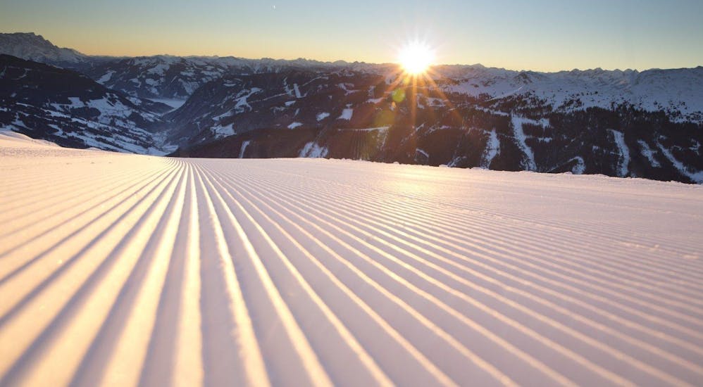 A picture of a groomed slope in Saalbach ready for ski lessons.