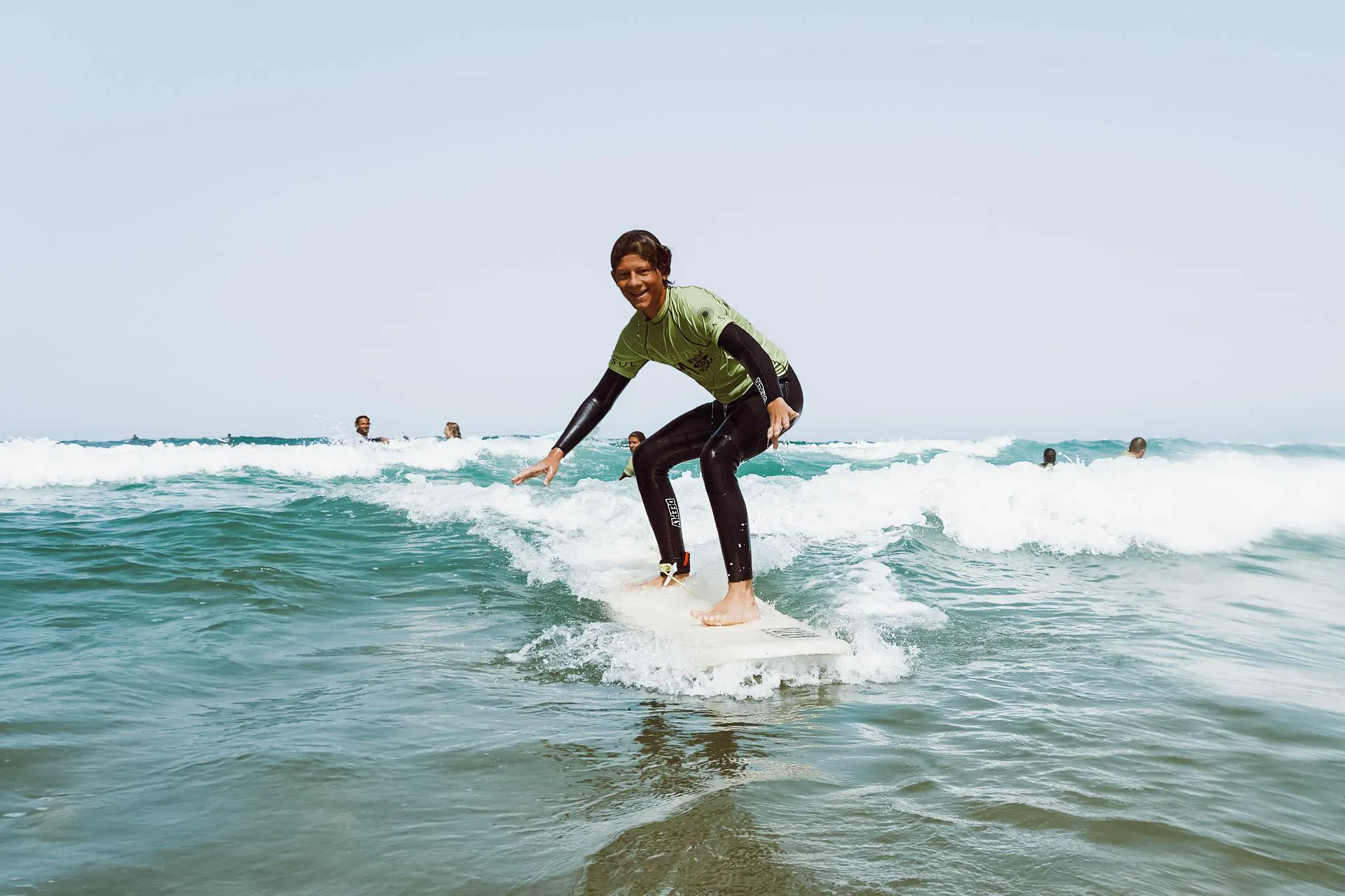 Beautiful landscapes showcasing mountains and sea, where the experiences of Wanted Surf School Cascais are taking place.