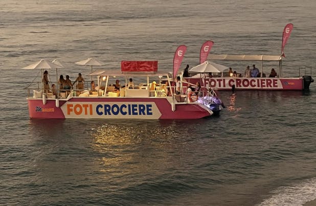 Beautiful landscapes showcasing mountains and sea, where the experiences of Foti Crociere Bagnara Calabra are taking place.