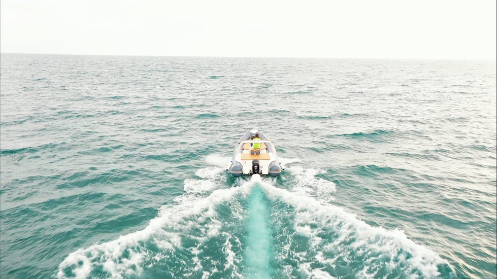 Picture of a RIB boat from the RIB boat rental service from Sea Star Marsala in the sea.