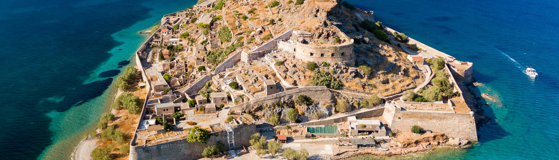 View from the sky of Spinalonga that you can visit during one of the trips provided by Indigo Cruises Elounda.