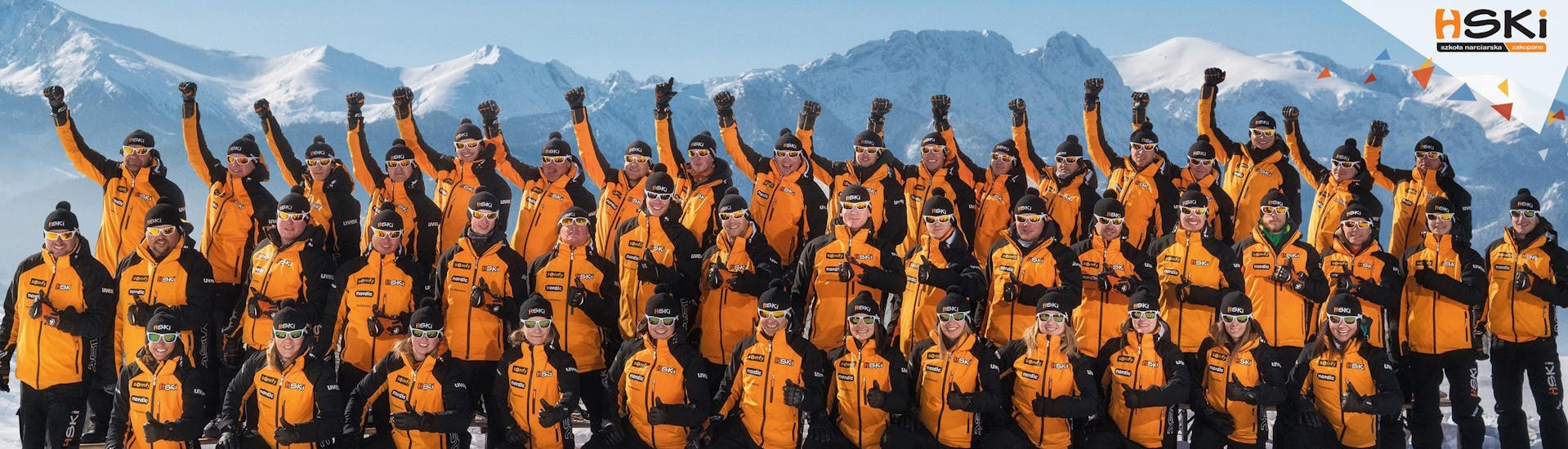 The whole HSKI team posing for a group photo with ski school HSKI Zakopane.