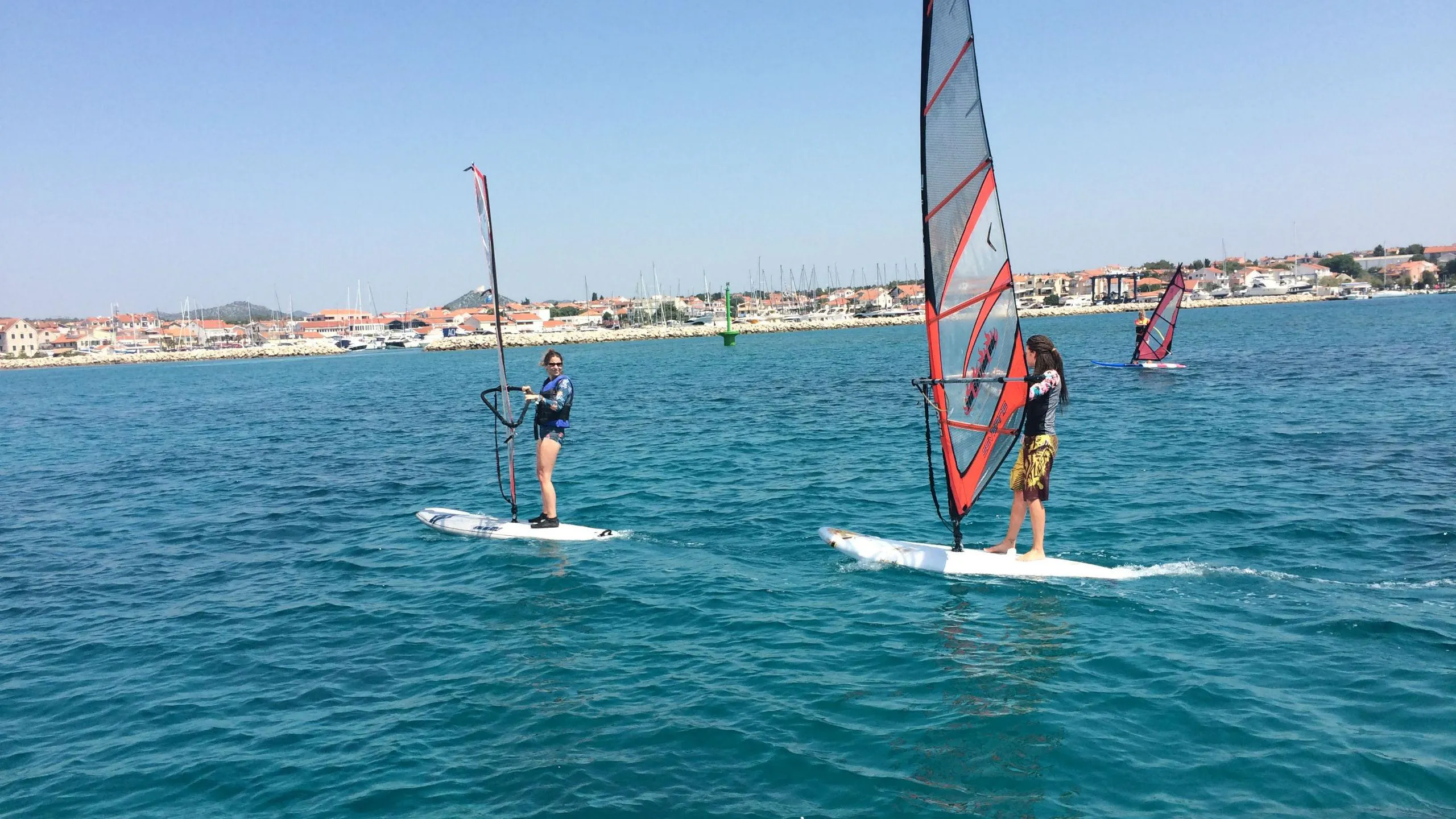 Beautiful landscapes showcasing mountains and sea, where the experiences of BlueWind Adventure Vodice are taking place.