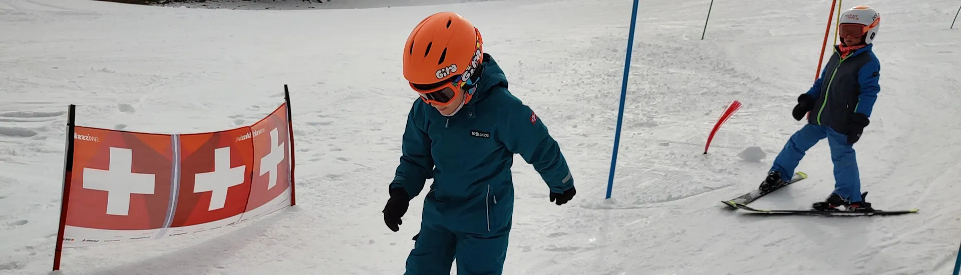 Edel Ski Flumserberg Kid skiing down the hill during the ski lesson of Edel Ski Flumserberg.