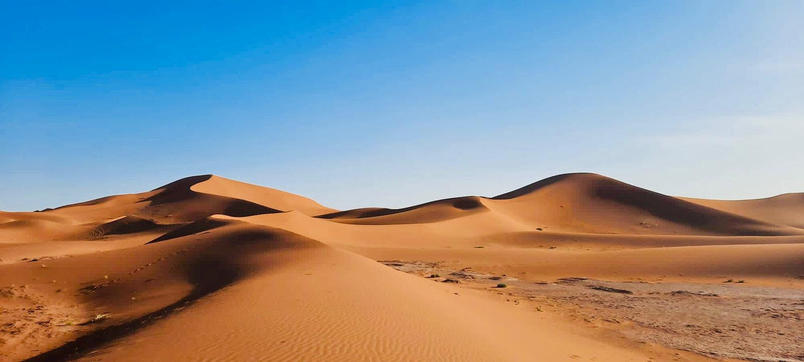 Terra Nomadic Travels Marrakech Beautiful landscapes showcasing mountains and sea, where the experiences of Terra Nomadic Travels Marrakech are taking place.