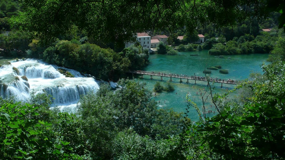 Group of people doing a tour through Krka National Park with Jadera Booking Zadar.