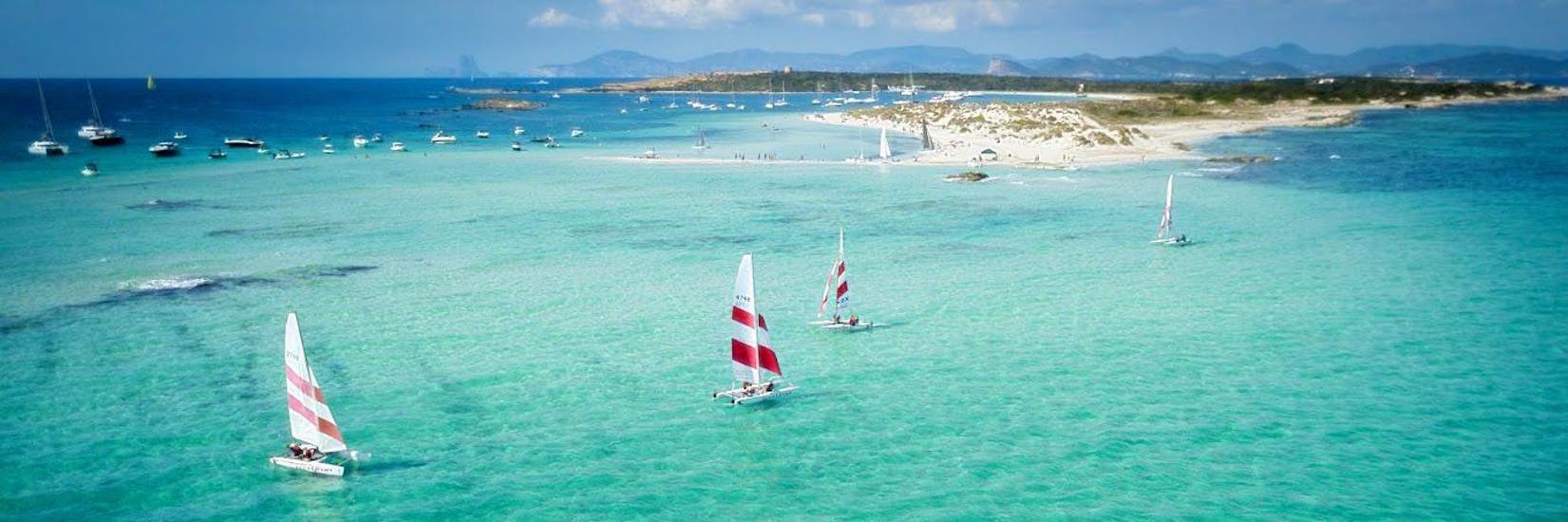 Some sailing boats of Wet4 Fun Formentera in the middle of a sailing course.