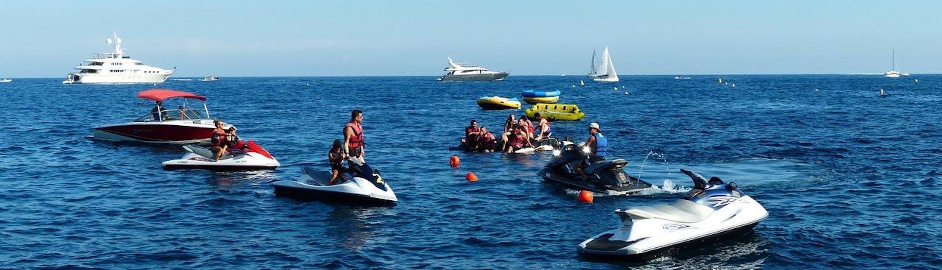 People on their jet skis during a jet ski ride to caves.