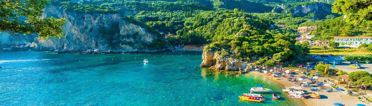 jet-ski-water-sports-corfu_SEM-Resort-Hero View of a beautiful beach in Corfu, where many watersports activities take place.