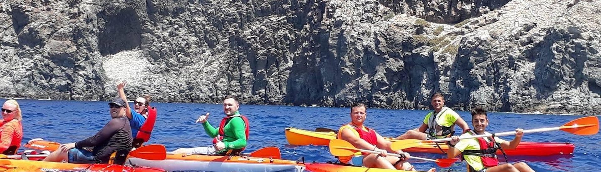 A group goes kayaking near Los Cristianos with Kayak Academy Tenerife. 