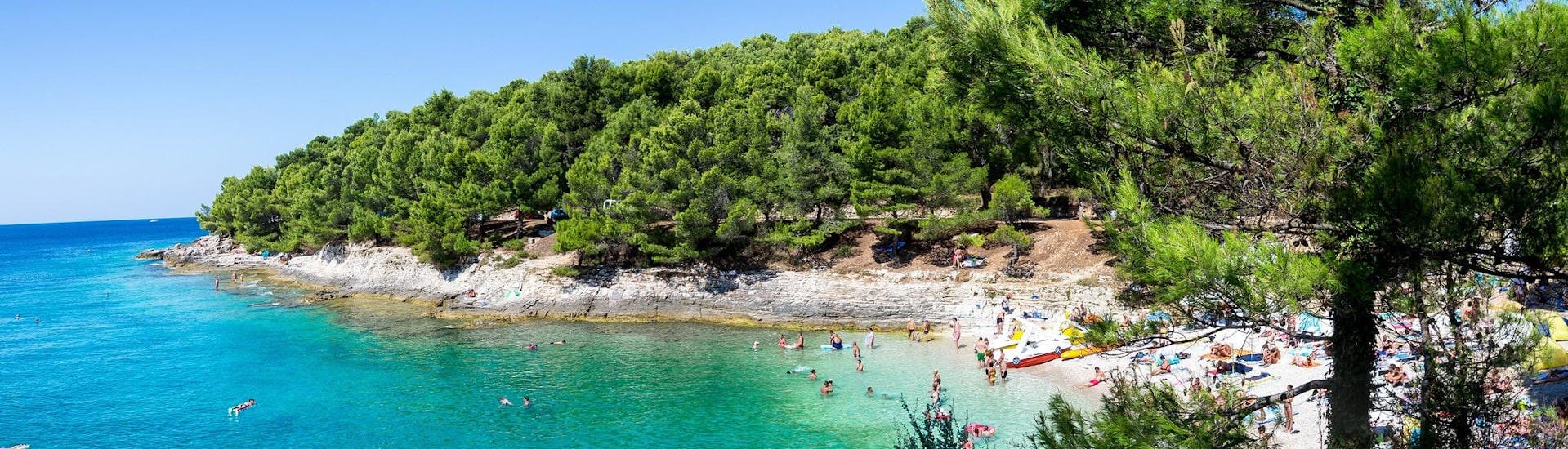 View of the beach at Cape Kamenjak, a popular destination for sea kayaking in Pula.
