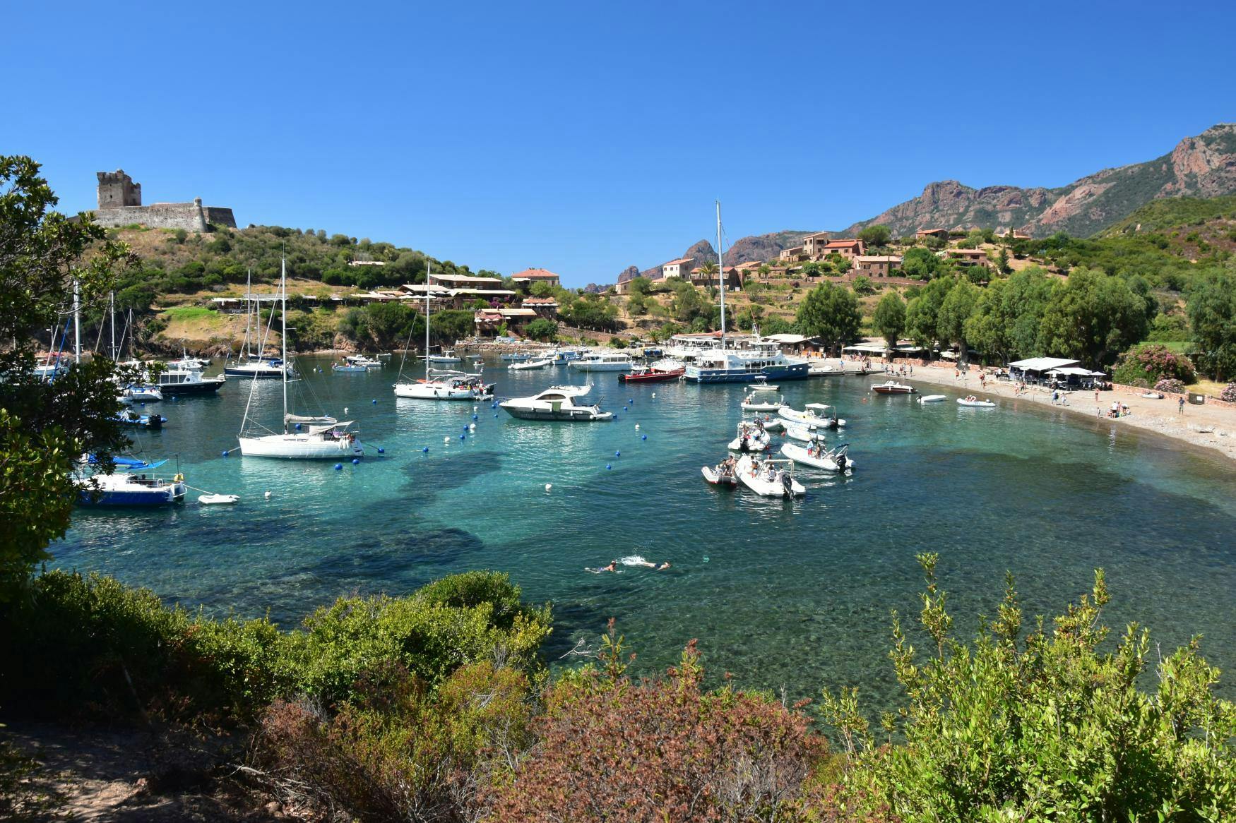 L'Eivissa Promenades en mer Porto Beautiful landscapes showcasing mountains and sea, where the experiences of L'Eivissa Promenade en Mer Porto are taking place.