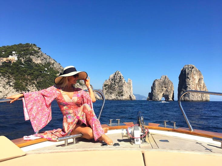Picture of a woman on a boat from MBS Blu Charter Sorrento during a boat trip to Capri.