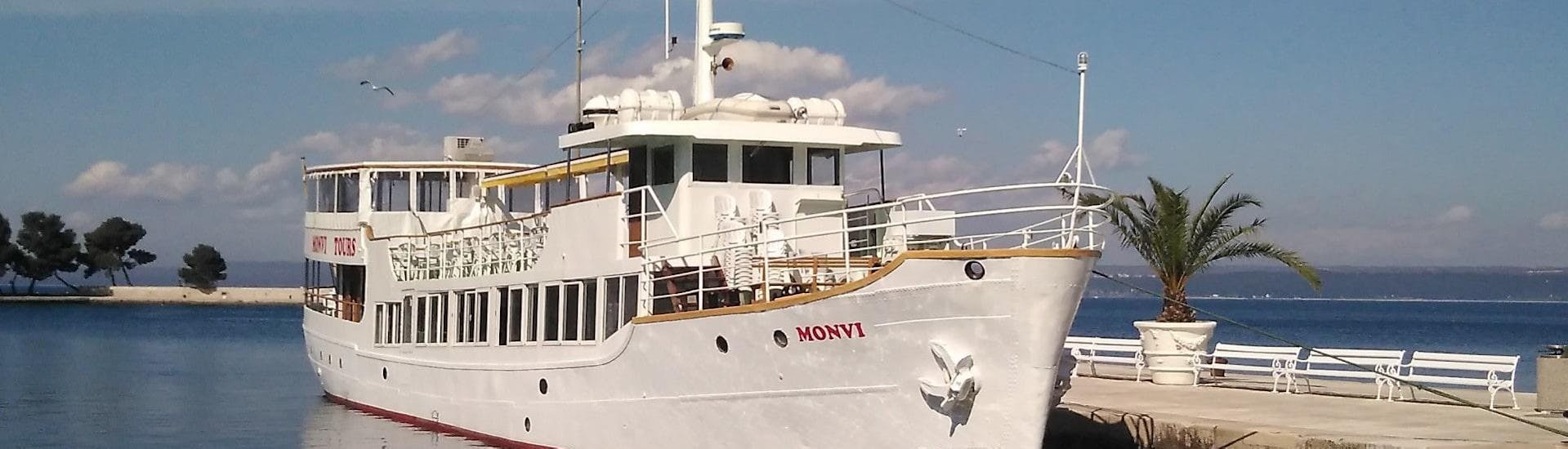 An image of the Monvi Tours Poreč boat as it anchors in the harbour of Poreč.