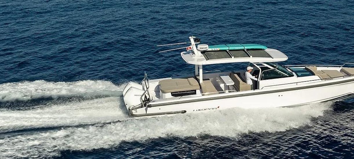 The Axopar 37 Meditterana speedboat of Nautiful Malta on the water. 