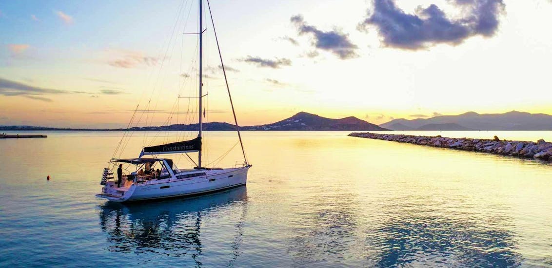 The sailing yacht of Naxos Catamaran, who offers different cruises starting from the Port of Naxos, is tthe perfect place to observe the sunset over the Aegean Sea.