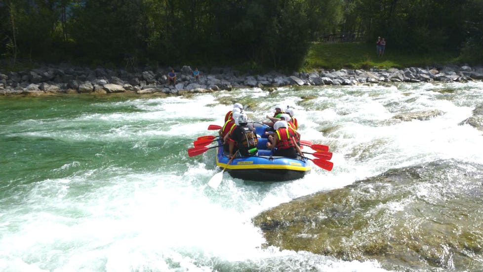 A group of people is rafting in a boat while Rafting on the Isar River in Lenggries for Beginners from Outdoor Dahoam Lenggries