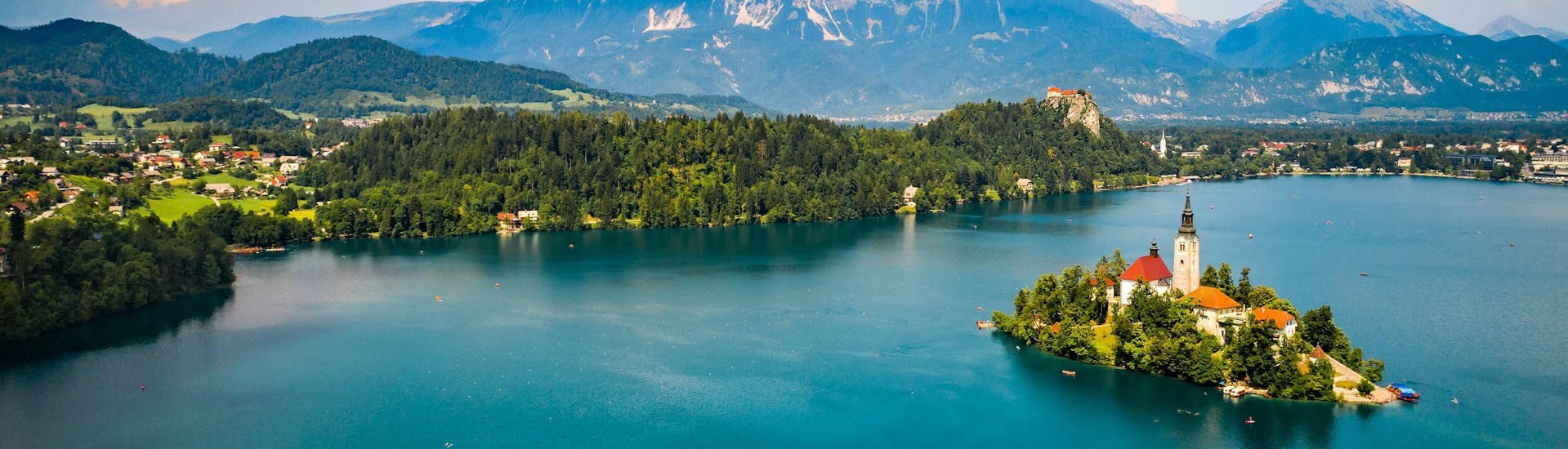 View over the beautiful lake Bled, which is a popular destination for paragliding. 