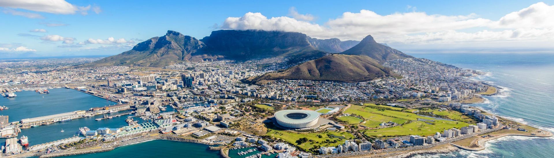 An aereal view of Cape Town, where visitors can go paragliding from Signal Hill.