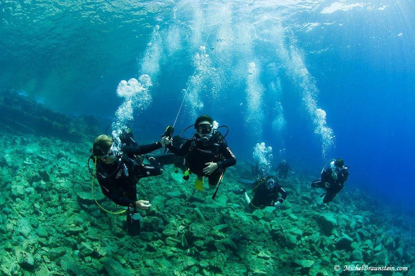 A group of people go diving in Agios Nikolaos with Pelagos Dive Center Crete.