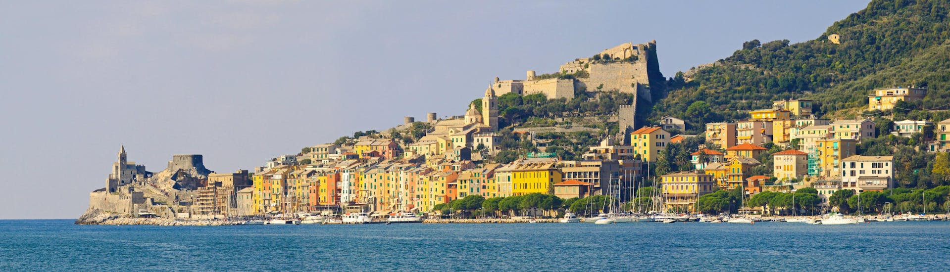 View of the pier of Porto Venere, Italy, a popular destination for boat trips.