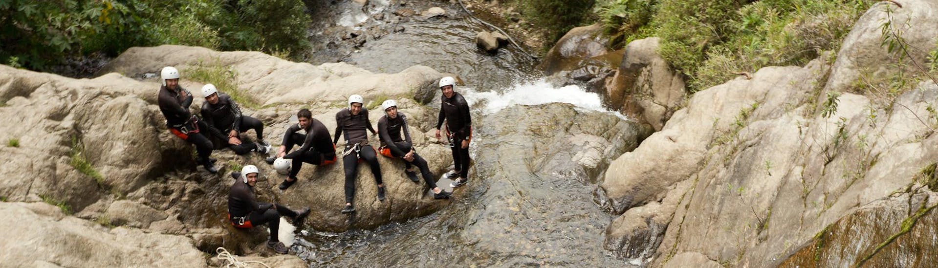 Group of friends having a great time celebrating a bachelor party doing Rafting and Canyoning.