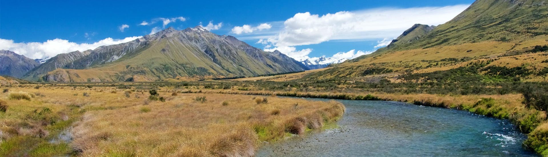 An image of the Rangitata River flowing past Mount Sunday, a popular river amongst those who want to go rafting near Christchurch.