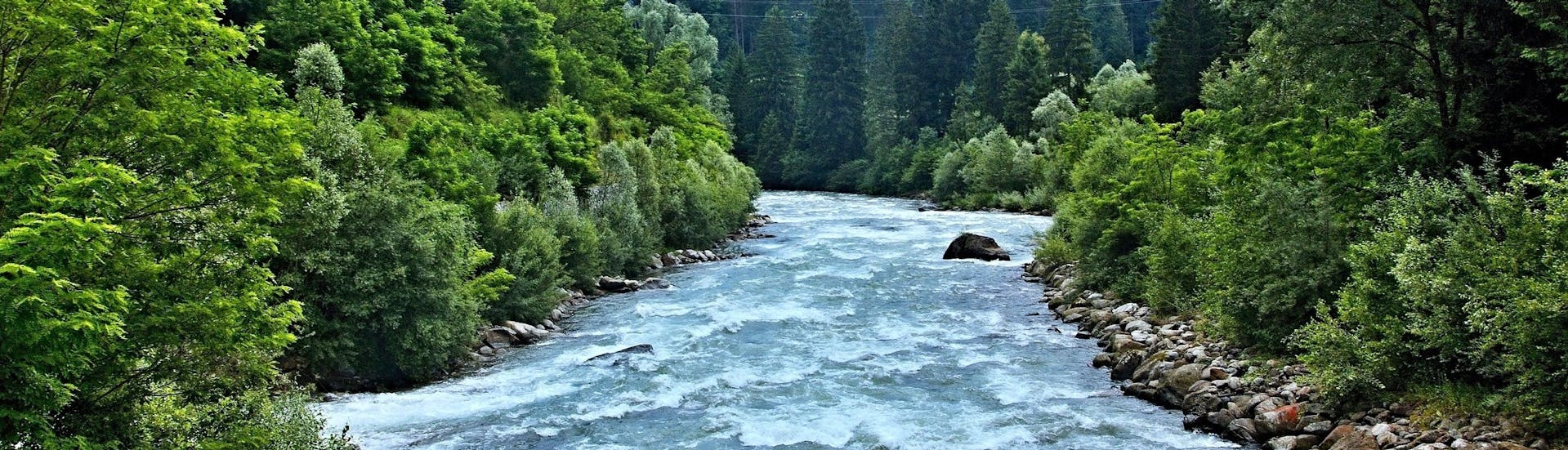 An image of the Noce River, a popular place to go rafting in Val di Sole.
