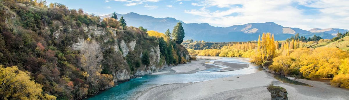 rafting-shotover-river_SEM-Resort-Hero1 A view of the beautiful Shotover River that visitors paddle along when rafting in Queenstown.