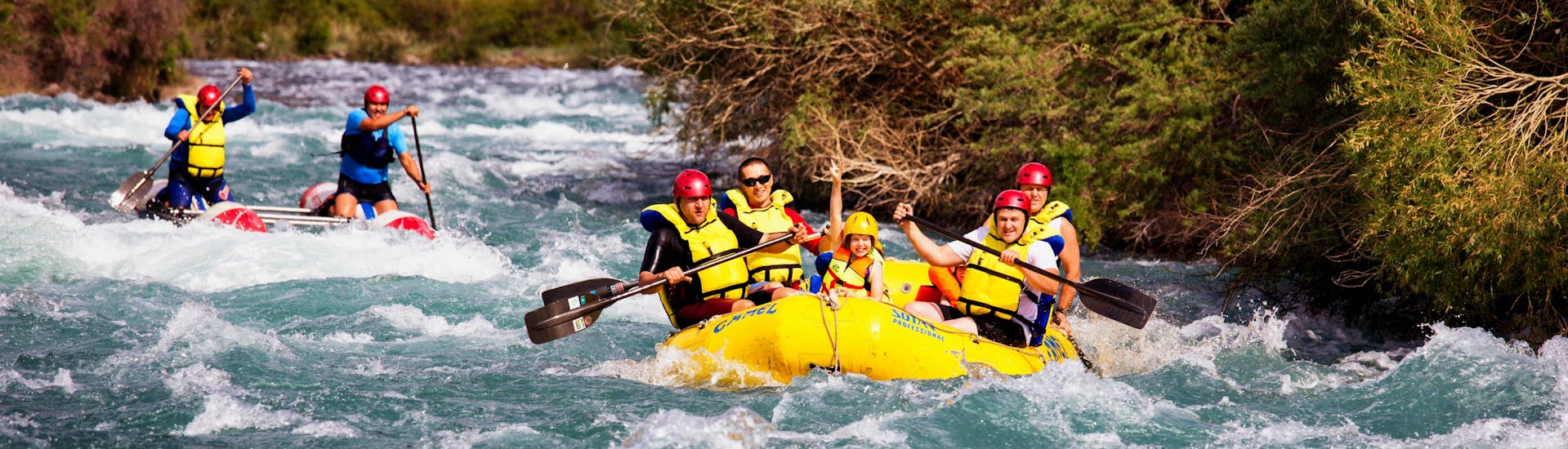  Parents and kids enjoy rafting in the river together