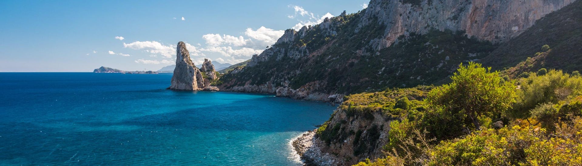 View of the beautiful Pedra Longa rock, at the coast of Baunei, Sardinia.